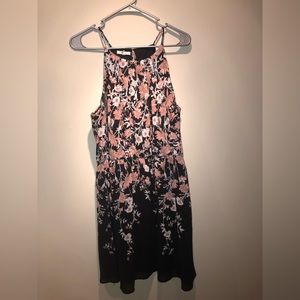A-line, mid thigh dress. Floral and black.